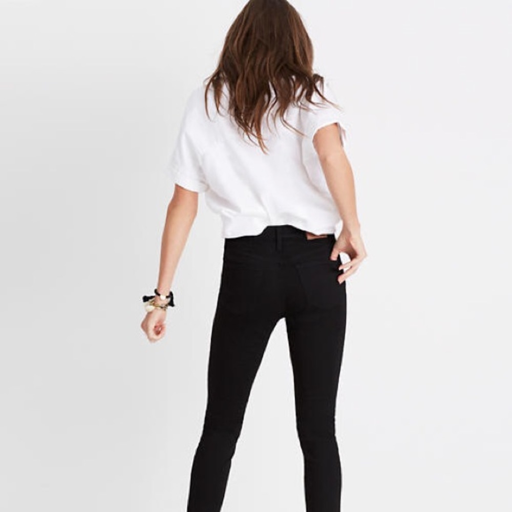 These are a pair of black Madewell jeans.